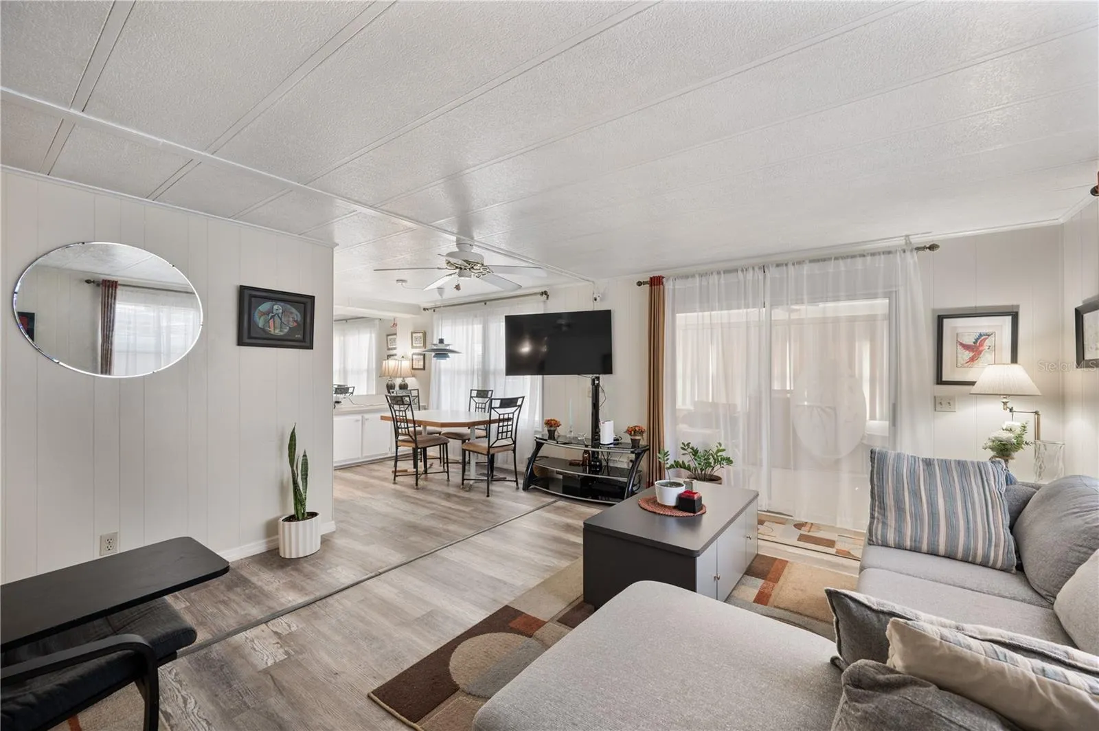 Living room with sliding doors to the sun room