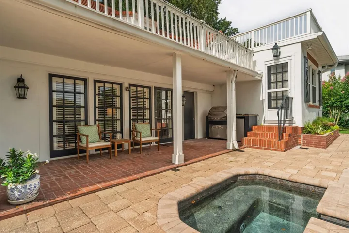 Back patio grill area and jacuzzi
