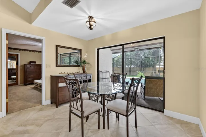 Dinette with sliders to pool