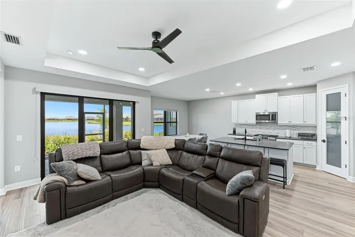 Family room with views of kitchen and dining room