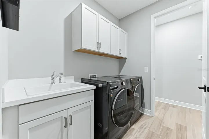 Upgraded laundry appliances with utility sink