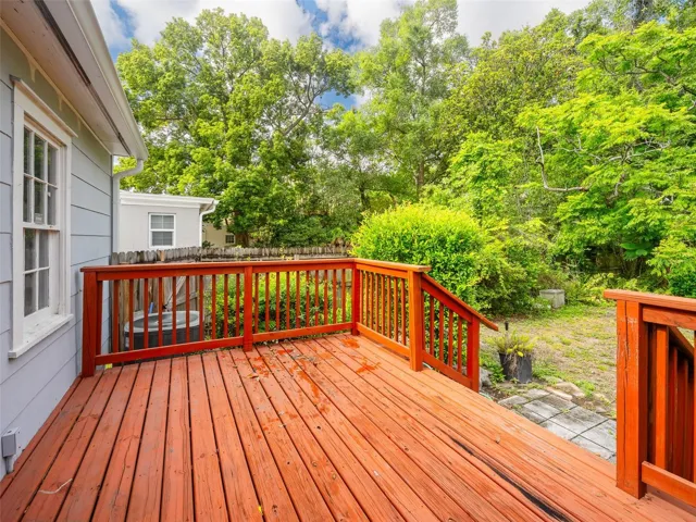 Wood deck overlooking yard.