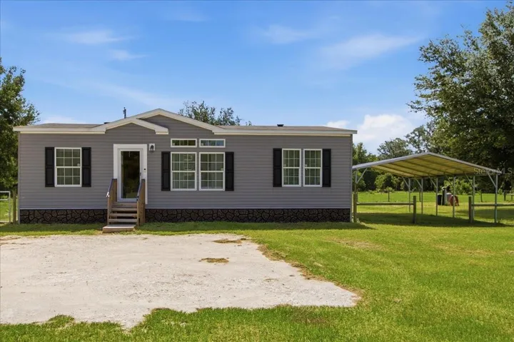 Front Exterior with Carport