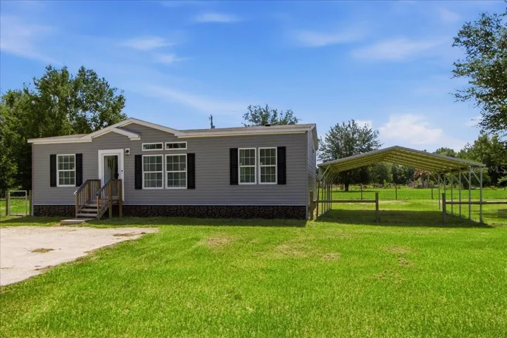 Front Exterior with Carport