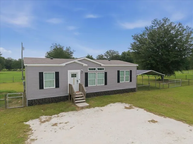 Front Exterior with Parking Pad