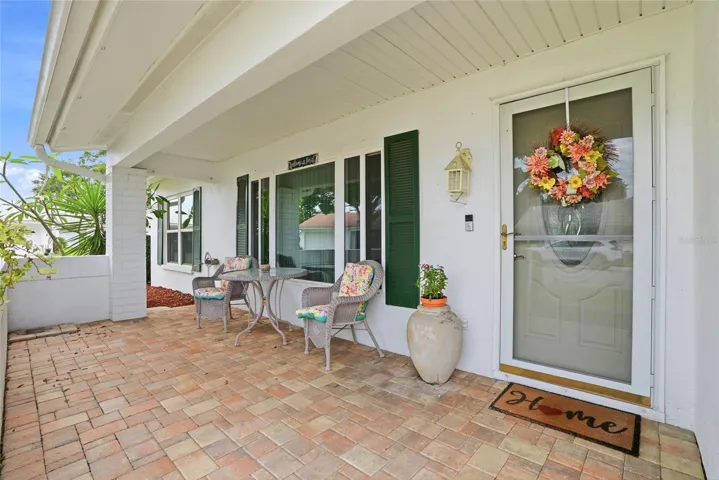 Nice front porch to sit out and enjoy the Florida sunshine!