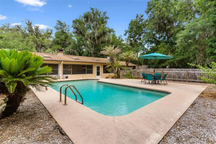 OVERSIZED LAP POOL.. fence gives privacy!