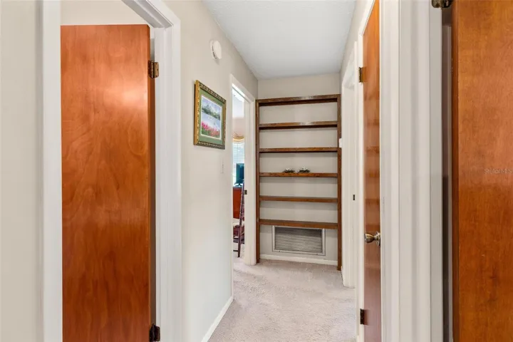 Hallway to bedrooms...custom shelving.