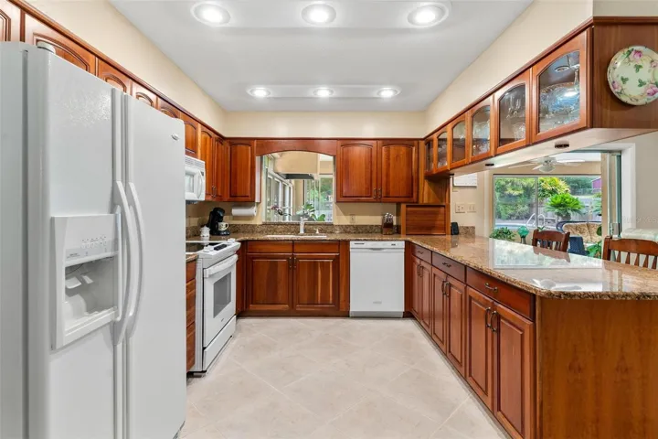 Lots of custom wood cabinets for storage!