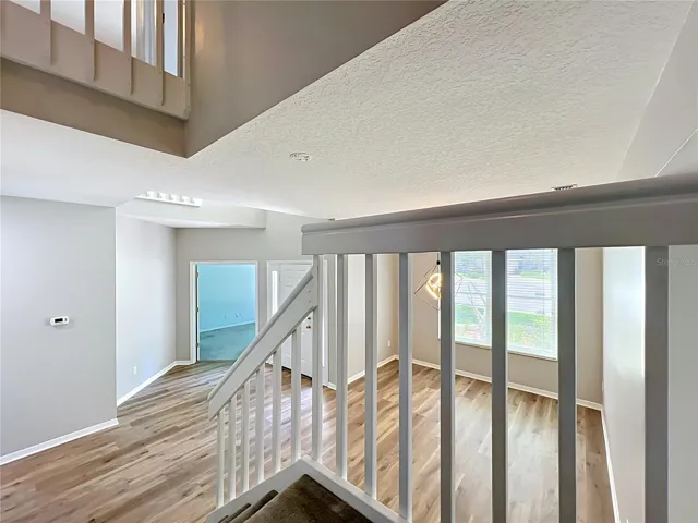 Foyer and Dining Room coming down from upstairs. Office is on left