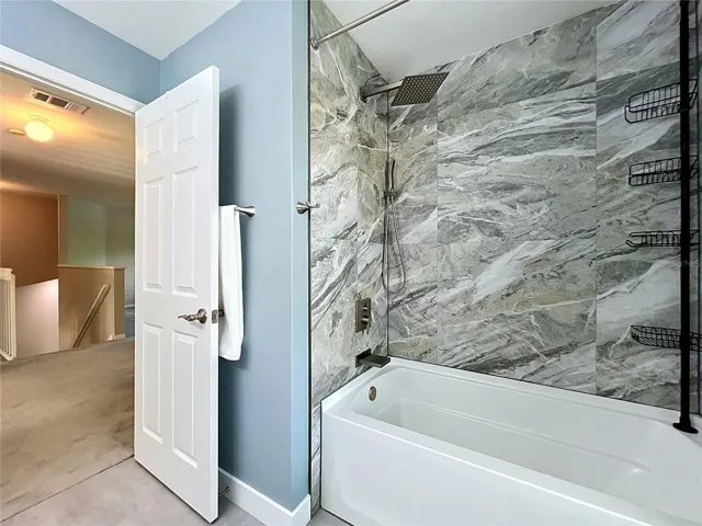 Updated Shower and Fixtures in upstairs bath.