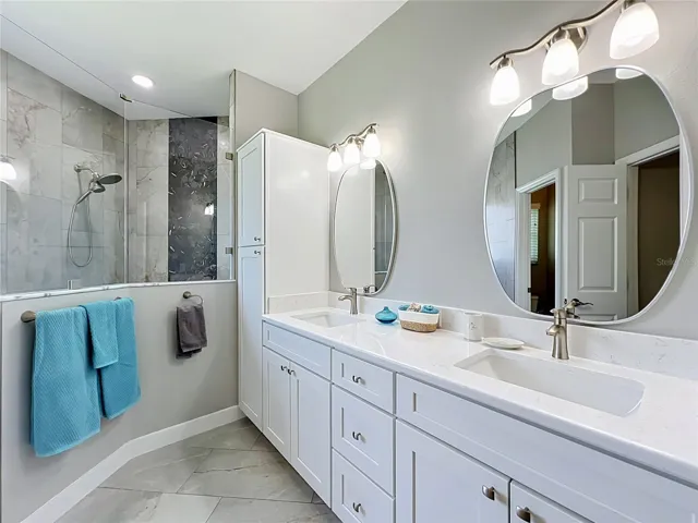Double Sinks with Quartz Counter tops.