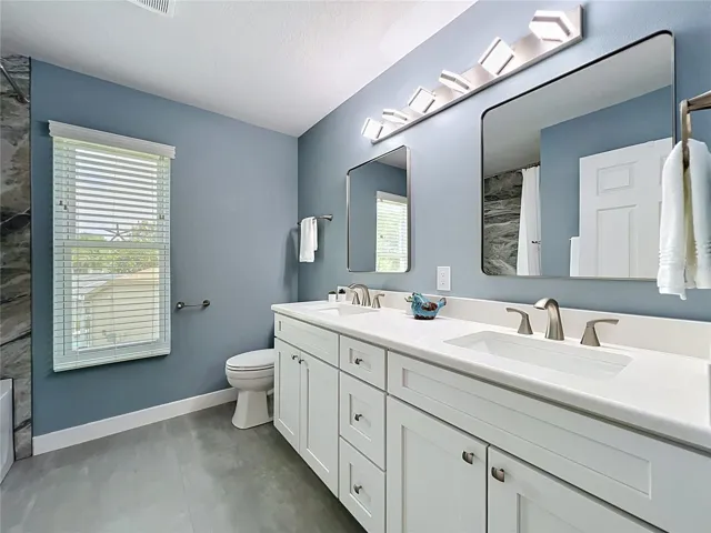 Quartz Counters, Double Sinks updated lighting.