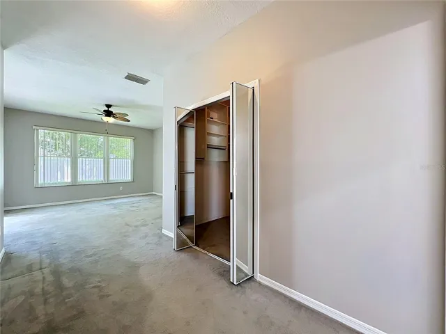 Primary Bedroom showing closet