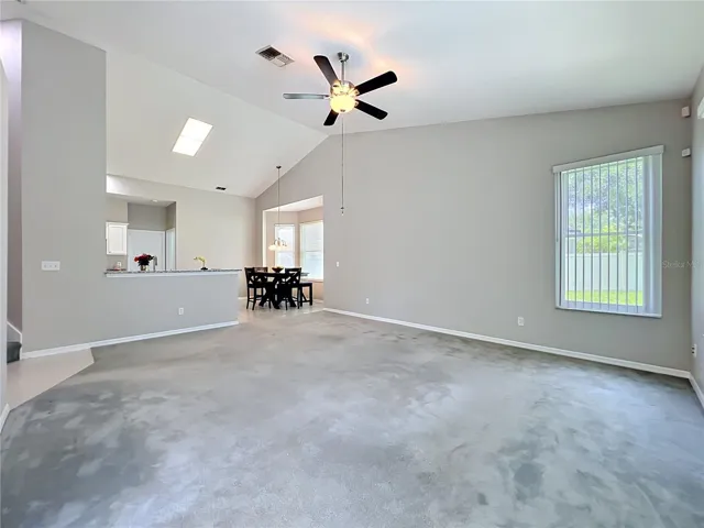 Alternate view of Family Room looking into Kitchen Area.