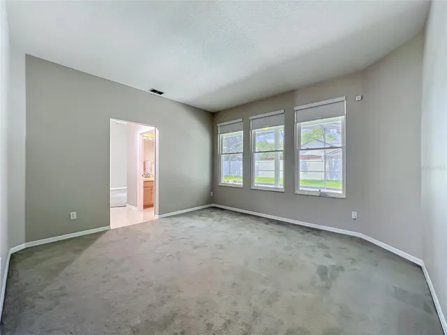 Living room  with access to the half bath
