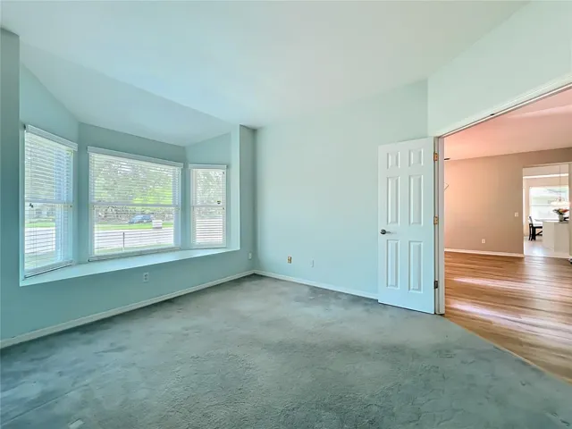 Office off of Front Door with the bay window