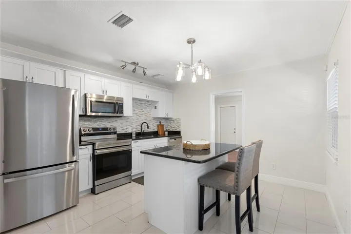 Kitchen with opening to bedroom #3 or office