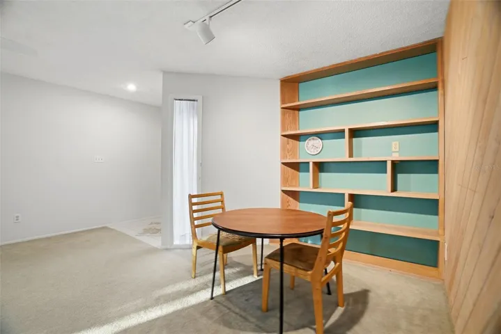 Built in shelving in the dining area of the Great Room.