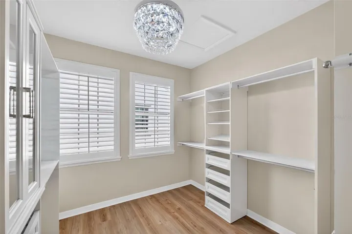 LARGE WALK IN CLOSET IN PRIMARY WITH AMPLE STORAGE