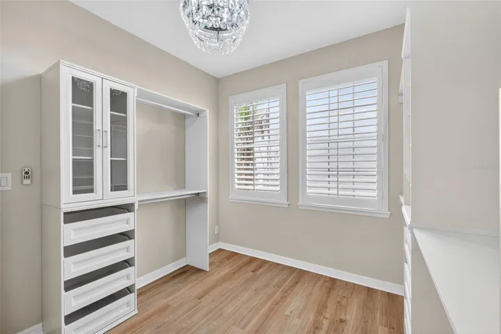 BUILT IN CLOSET STORAGE IN WALK IN CLOSET
