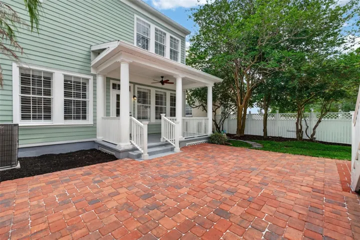 LARGE PAVER PATIO IN BACKYARD