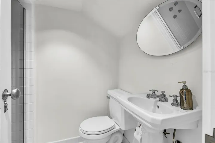 Original maid's quarters can be accessed off the primary suite or has an exterior entrance- includes bathroom and laundry