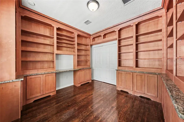 Guest Bedroom #3 made into a library with closet.