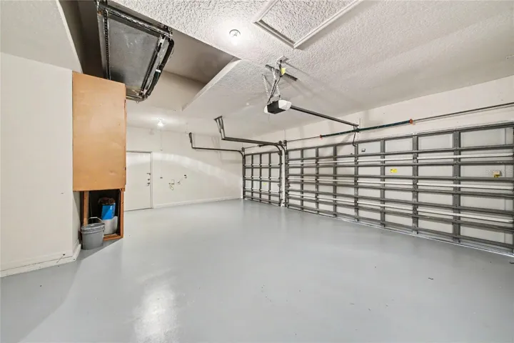 3-car Garage - newly painted garage floor.