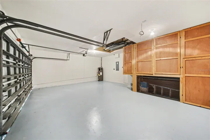 3-car garage with built-In storage, Newly painting garage floor.