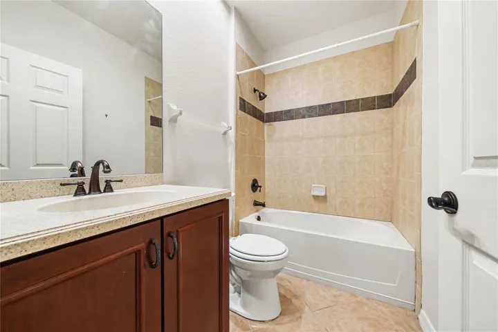 Guest Bath #2- with corian sink counter and tub.