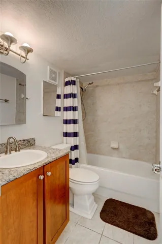 Full sized bathroom with bath/shower