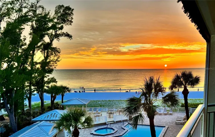 Gulf beach views from #304 balcony, Living area and primary bedroom.