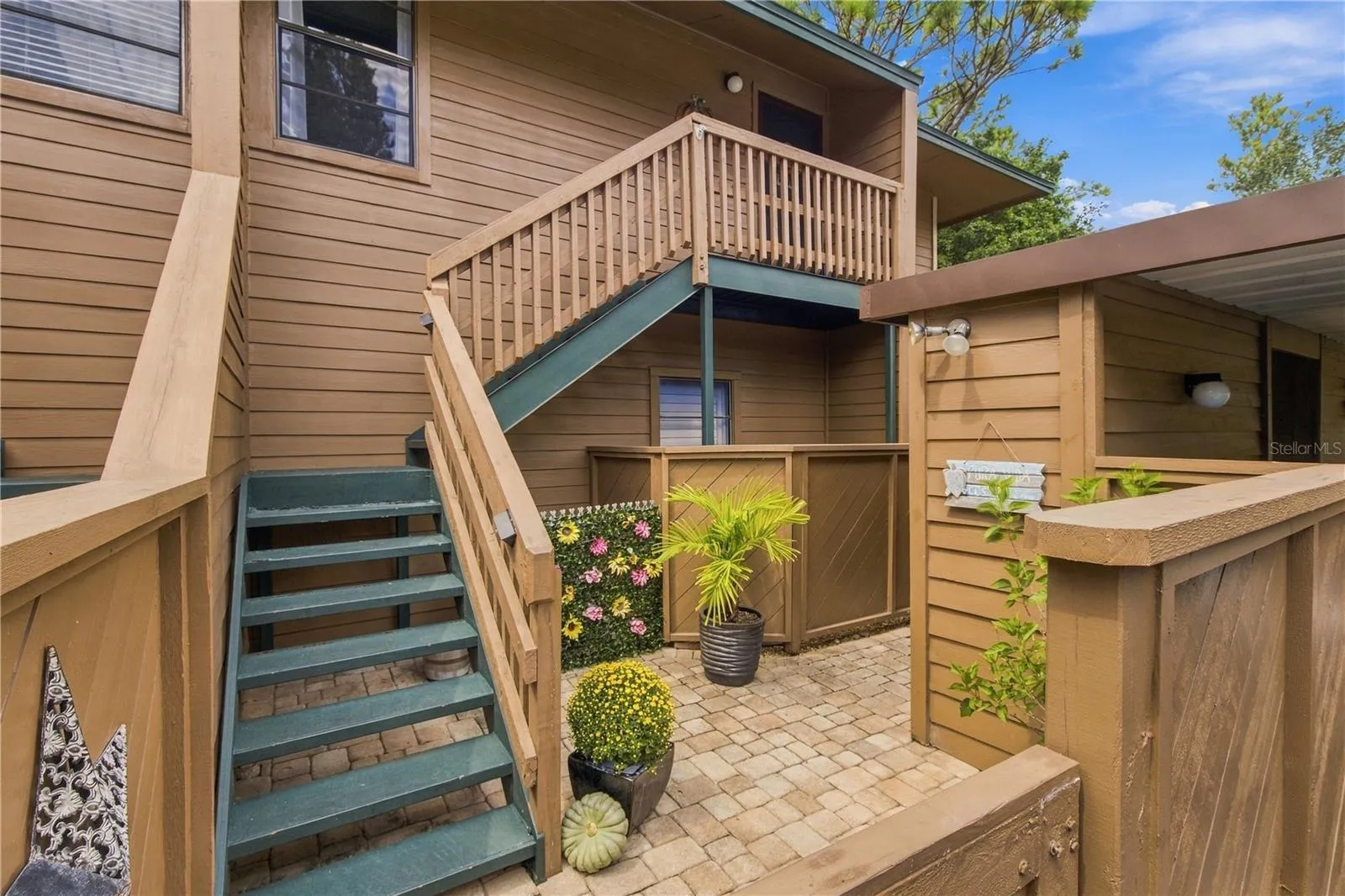 Stairway to 2nd floor unit
