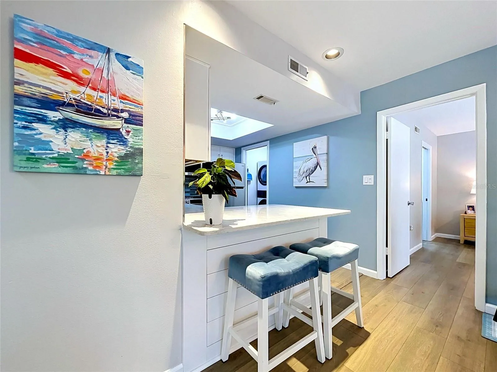 Laundry closet off of kitchen