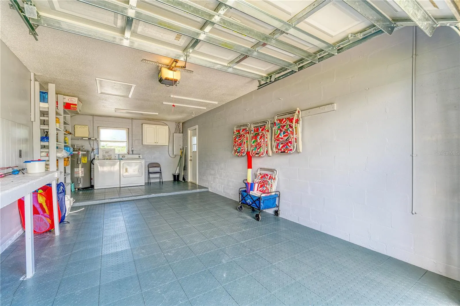 Over-sized Single Stall Garage with interlocking Floor Tiles
