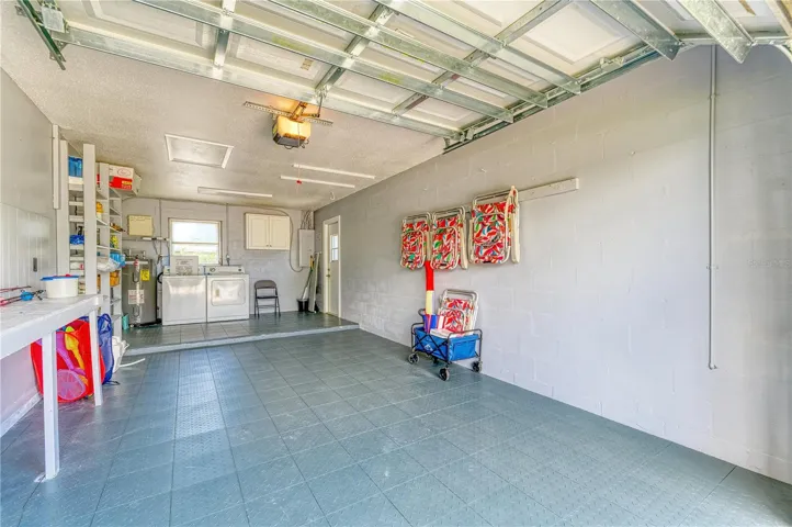 Over-sized Single Stall Garage with interlocking Floor Tiles