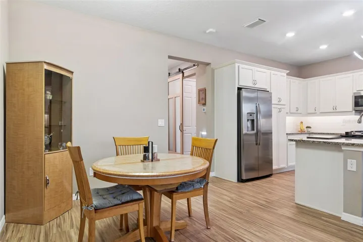 Back out in the great room there is room for a more formal dining space off the kitchen.