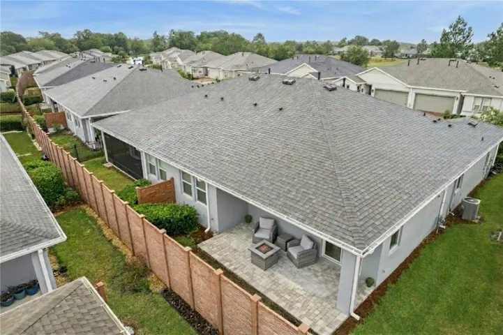 Virtually staged. Aerial view of your villa with privacy wall.