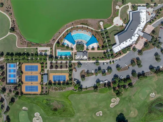 1 of the 3 Resort Style Pools, Tennis & Pickleball  Courts and Clubhouse aerial shot