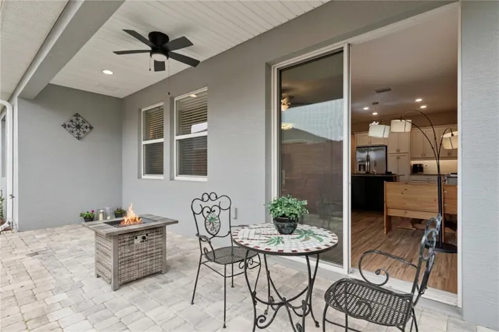 Step outside to your covered lanai with extended paver patio.