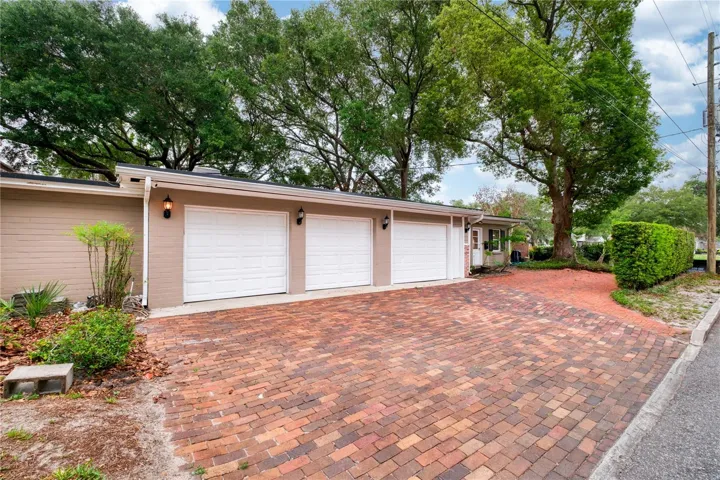 Three garage showing attached in-law studio apartment