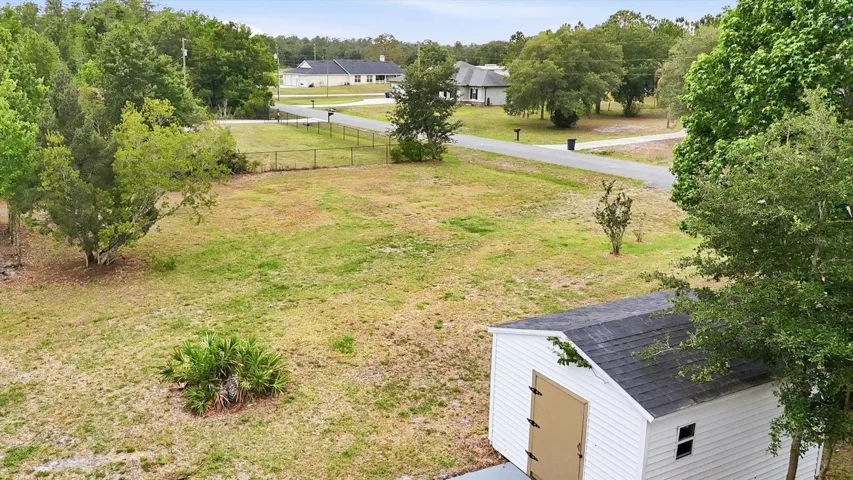 Access the backyard from the side street for added convenience