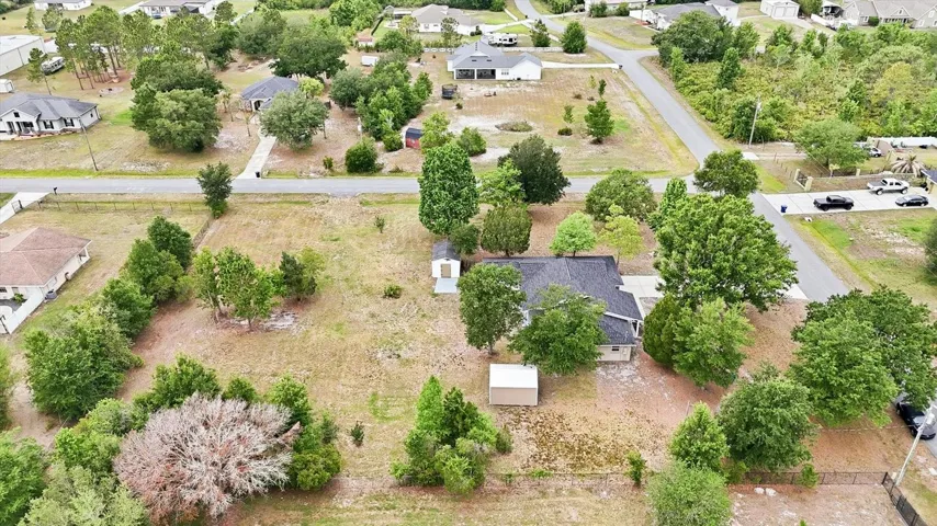 Birds eye view of property from the south ...country style living but not far from stores, restaurants, shopping & entertainment!