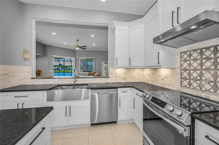 Farm Style Stainless Steel Sink, Dishwasher and pass through to Family Room