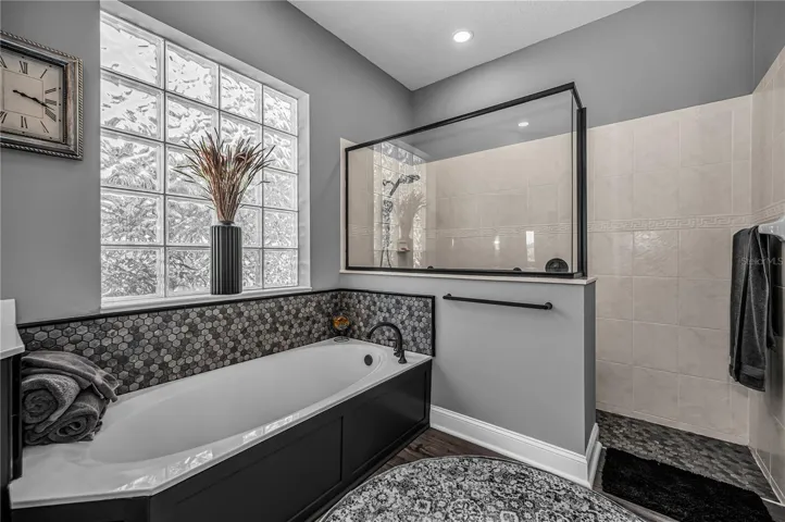 Primary walk in shower and tub