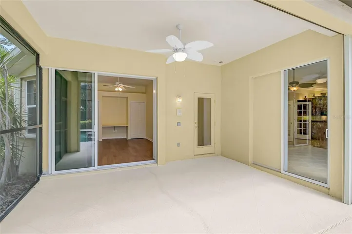 Under roof outside dining area off family room and den