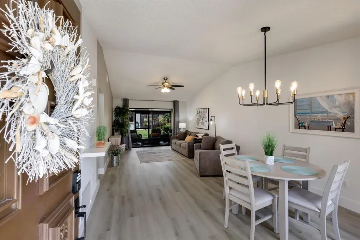 Open Dining & Living Room Area - Expansive Luxury Vinyl Plank Flooring (2024)