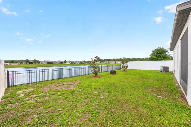 Spacious fenced backyard.