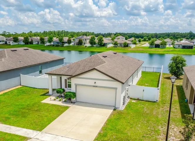 BUILT IN 2020 and loaded with thoughtful upgrades, this MOVE-IN READY home in the sought-after Fernanda Place community of Deltona delivers modern finishes, low-maintenance living, and beautiful POND VIEWS!